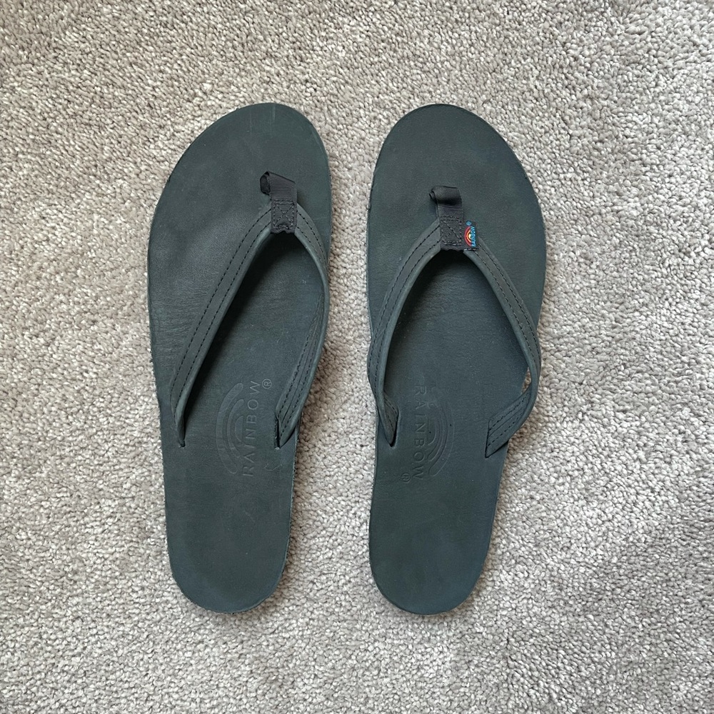 Rainbow black leather flip flops